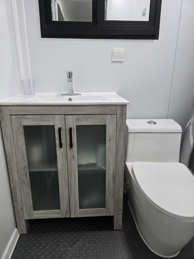 Área de baño / Bathroom area