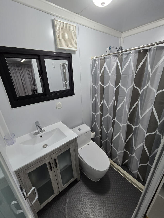 Área de baño / Bathroom area